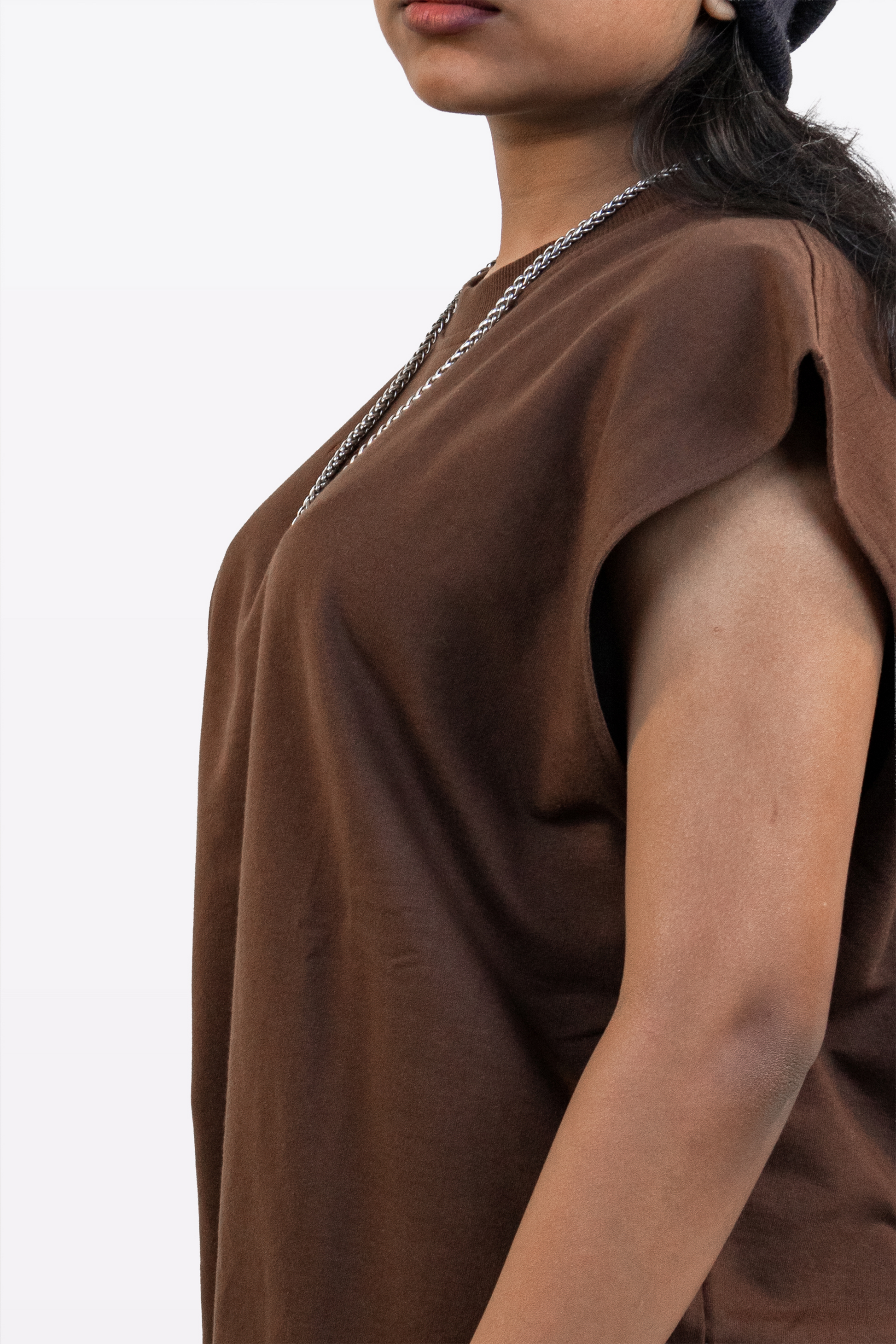 Side profile close-up of the Harper Slein Foundation Tank in Cacao, showing the oversized armhole and drape of the fabric against a white background.