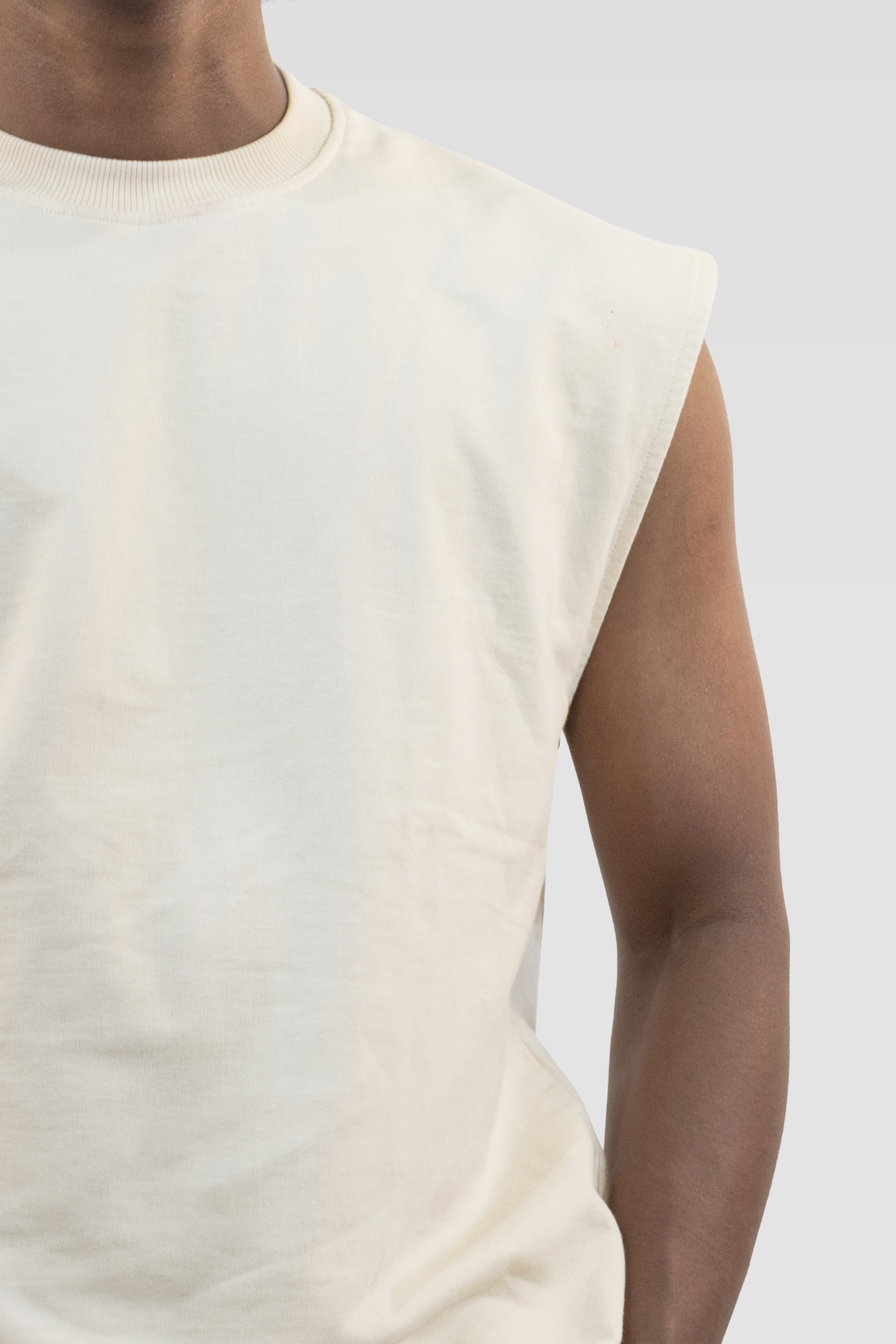 Close-up detail of the Harper Slein Foundation Tank in OG Off White, focusing on the chest and shoulder area against a plain background.