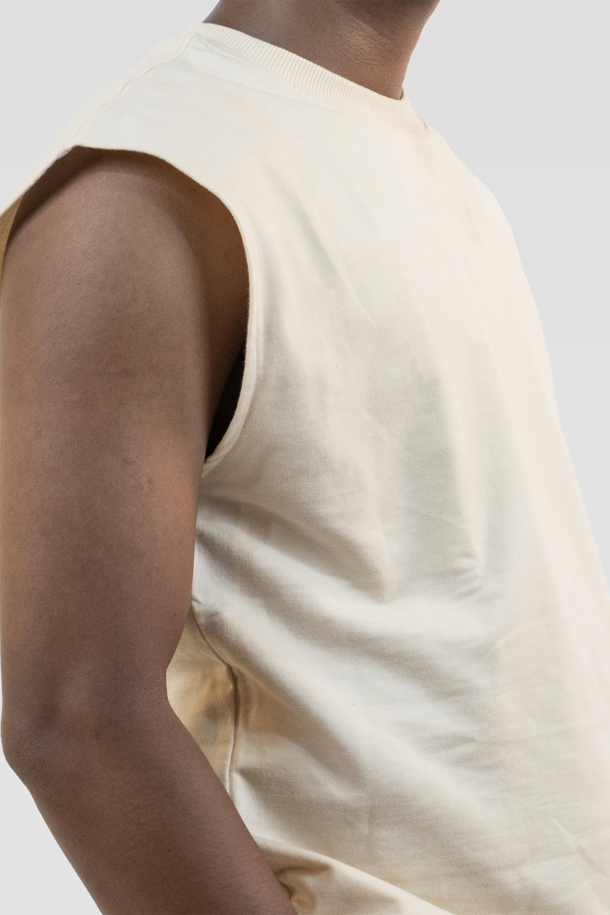 Close-up side detail of the Harper Slein Foundation Tank in OG Off White, showing the armhole and fabric texture.