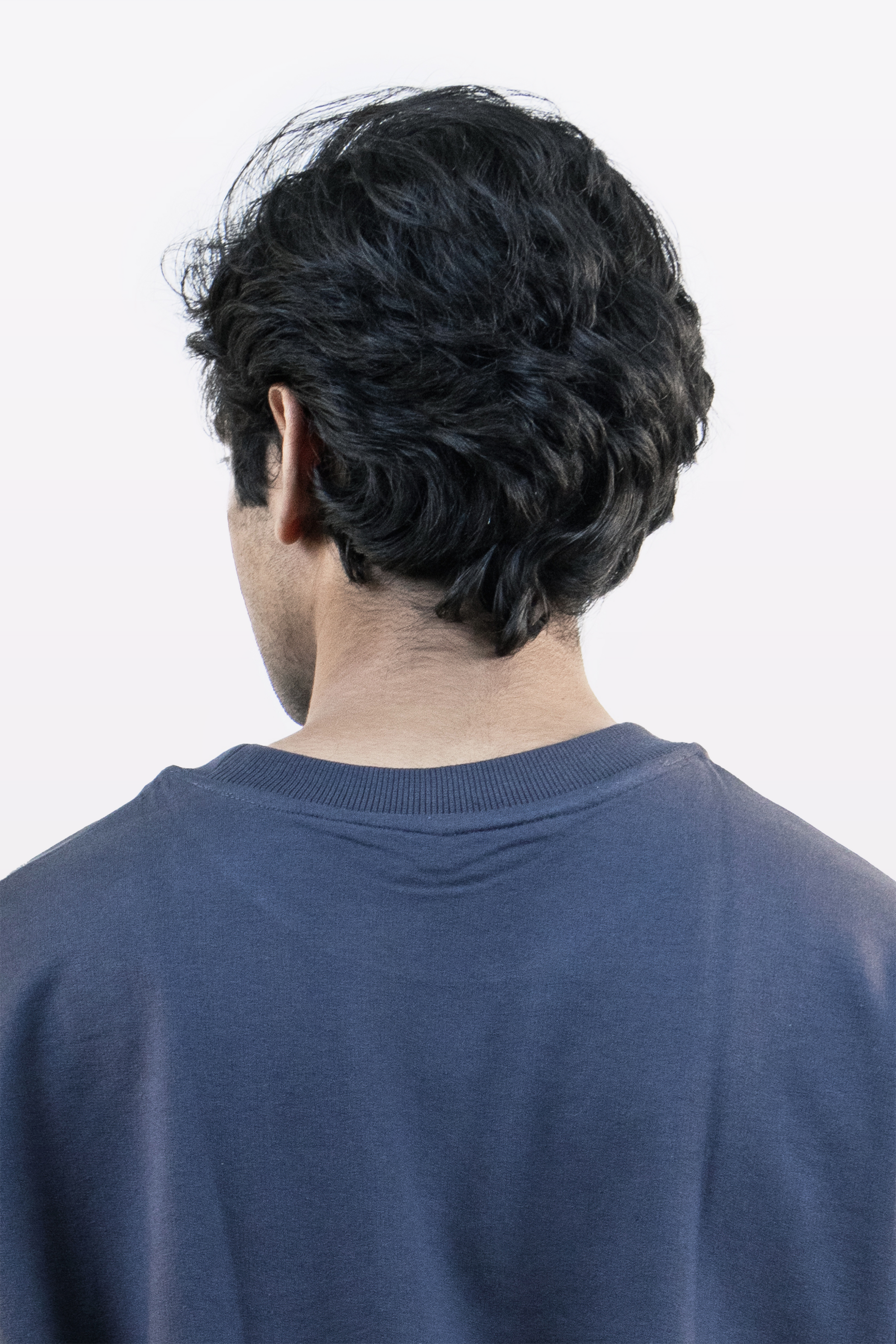 Close up back detail of Harper Slein oversized t-shirt in Compass Blue, showing neckline and fabric texture, on a white background
