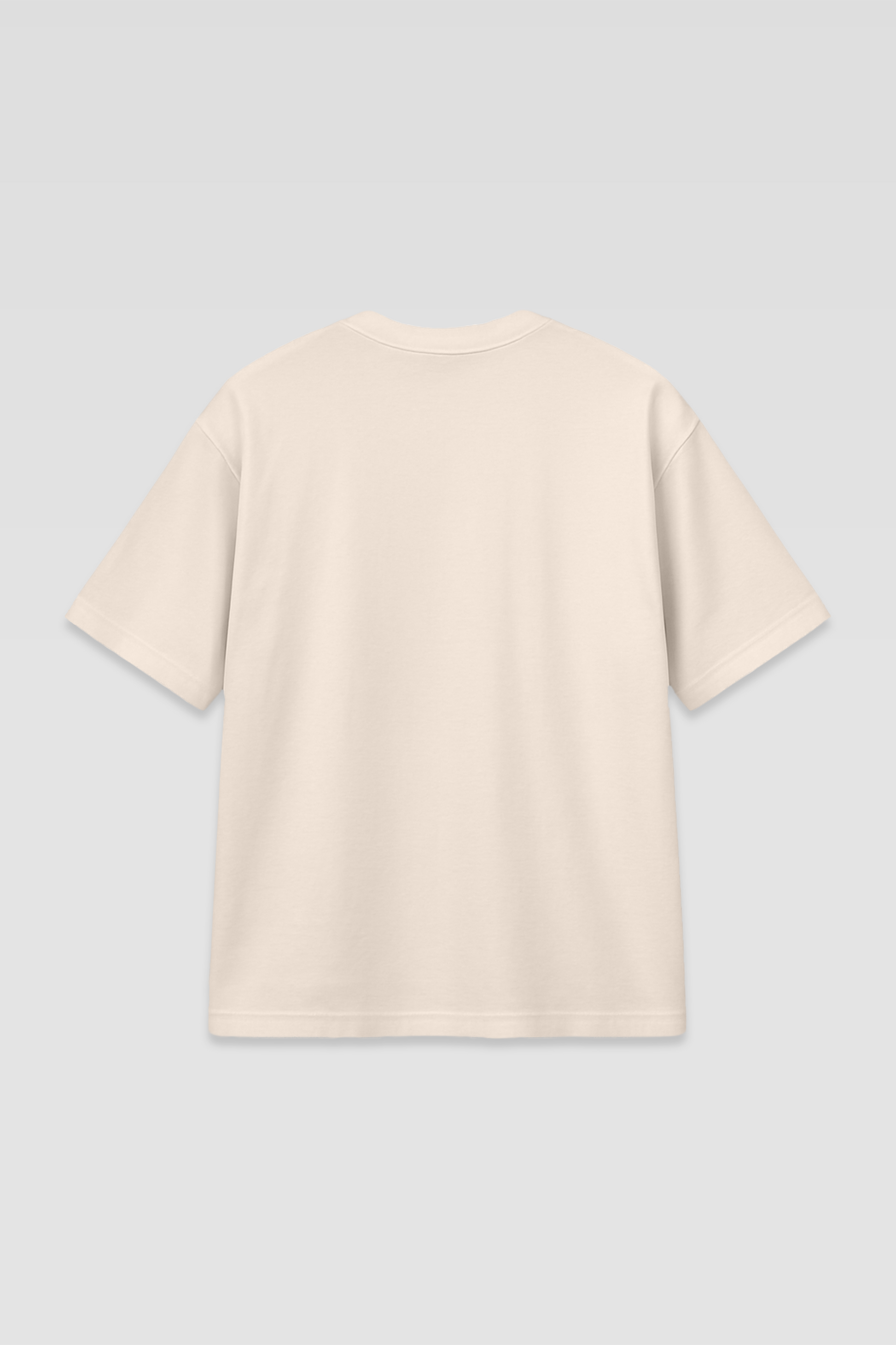 Flat lay of Harper Slein oversized t-shirt in OG Off White on a light gray background, showing back view and stitching details