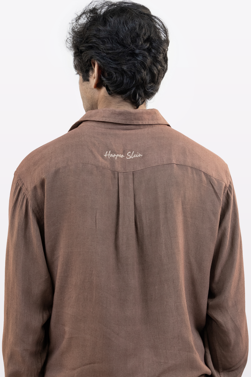 Harper Slein brown Contour Shirt back view with embroidered logo, worn by a model against a white background
