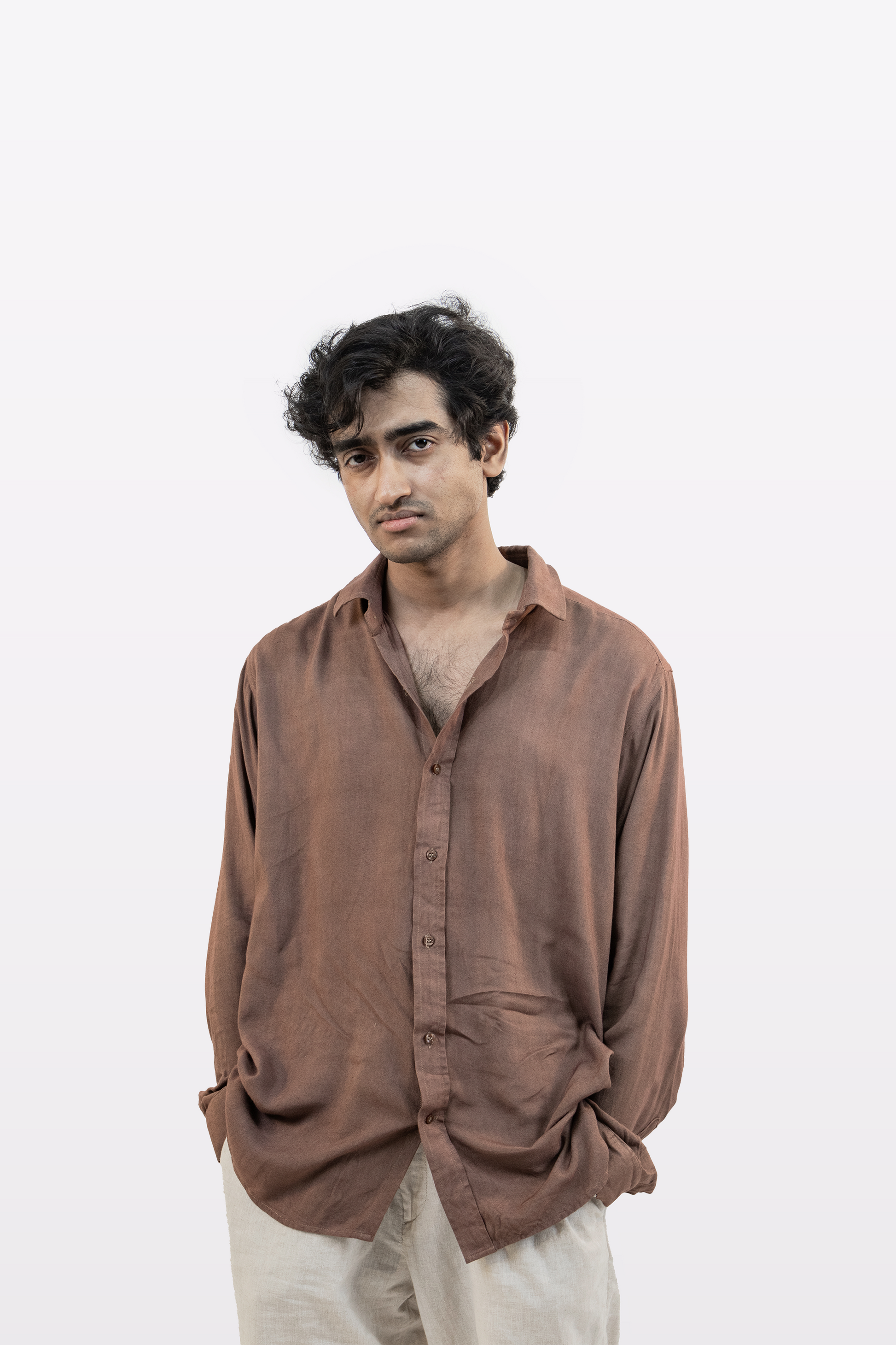 Harper Slein brown Contour Shirt styled with light pants, worn by a model against a white background