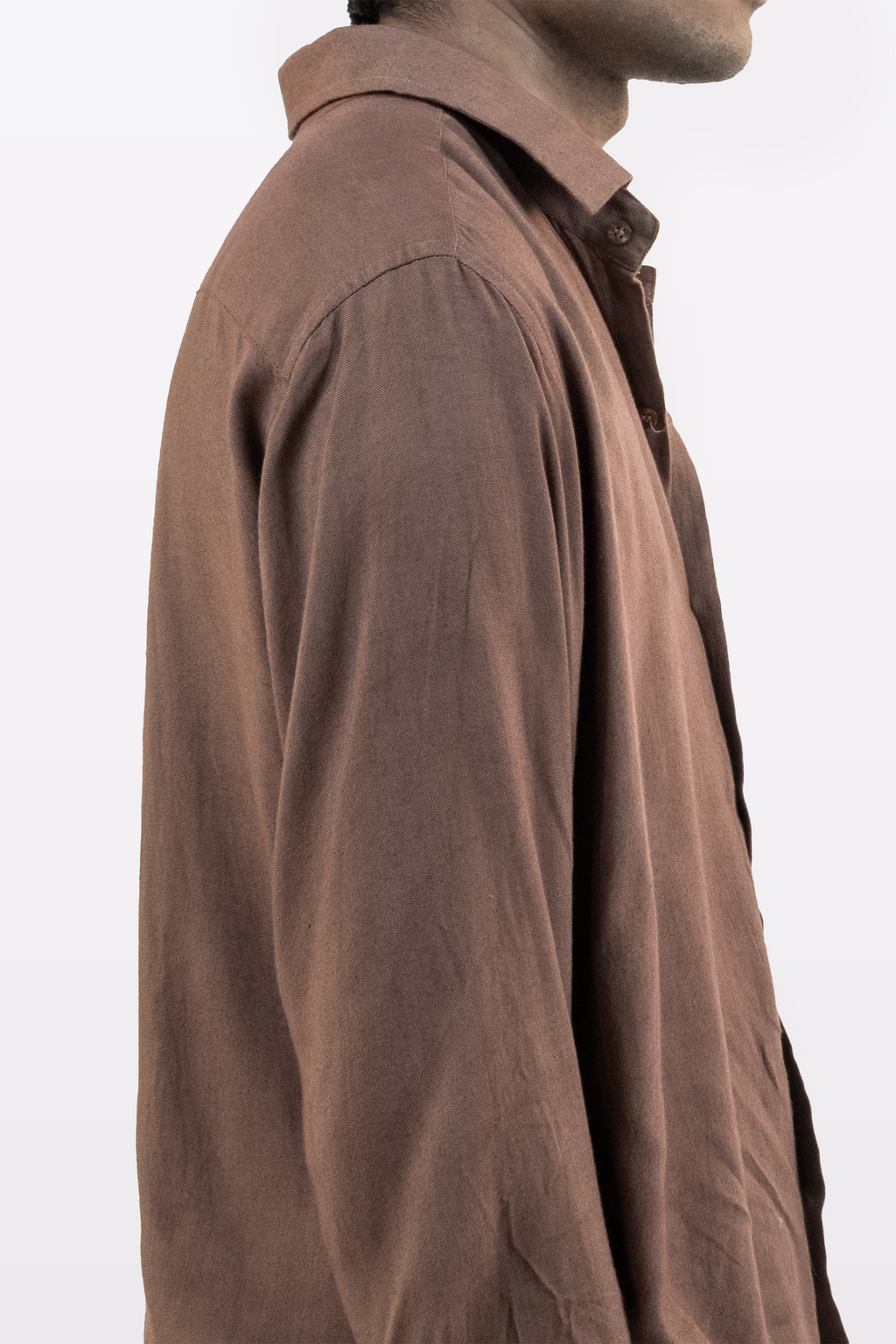Harper Slein brown Contour Shirt close-up side profile, worn by a model against a white background
