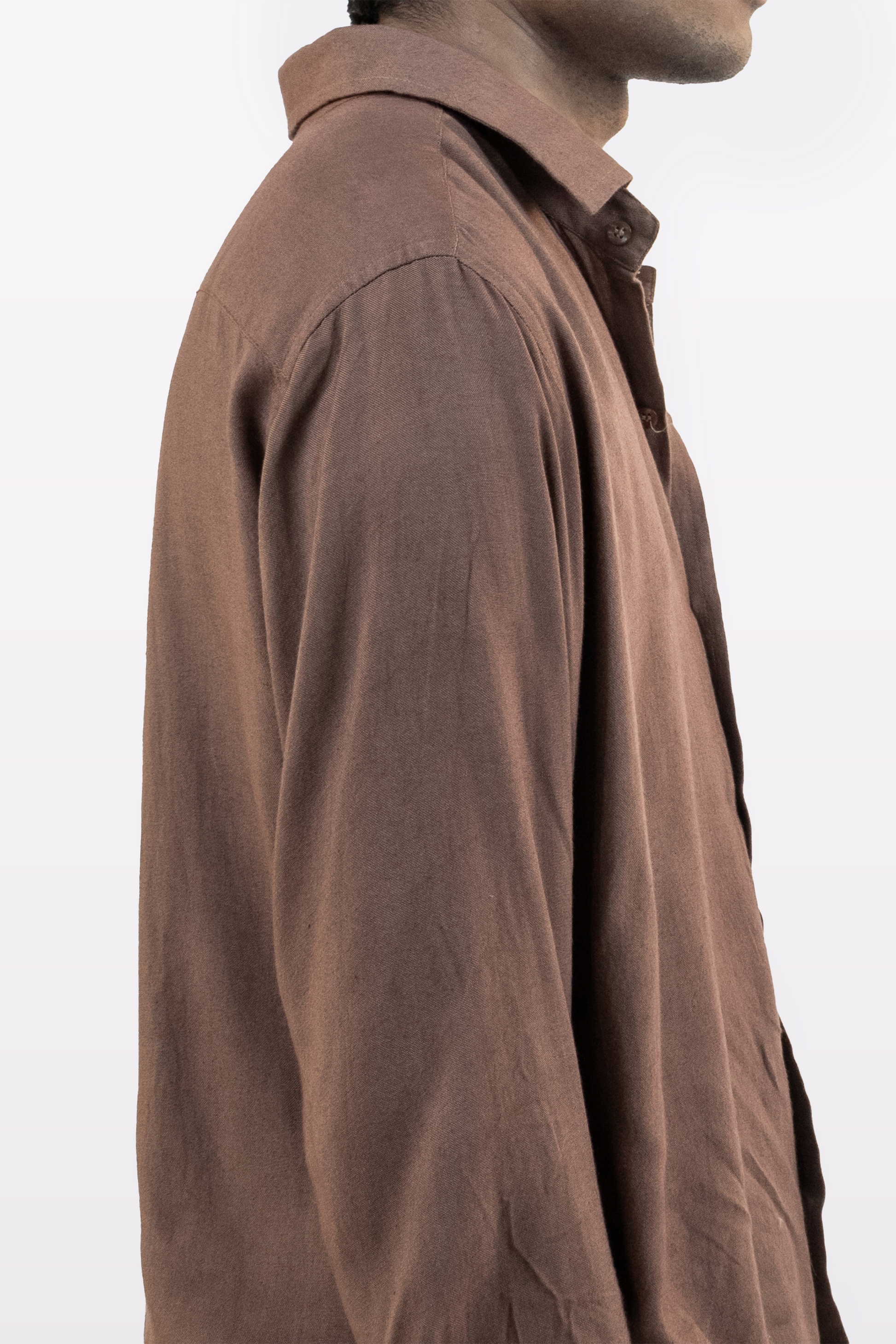 Harper Slein brown Contour Shirt close-up side profile, worn by a model against a white background
