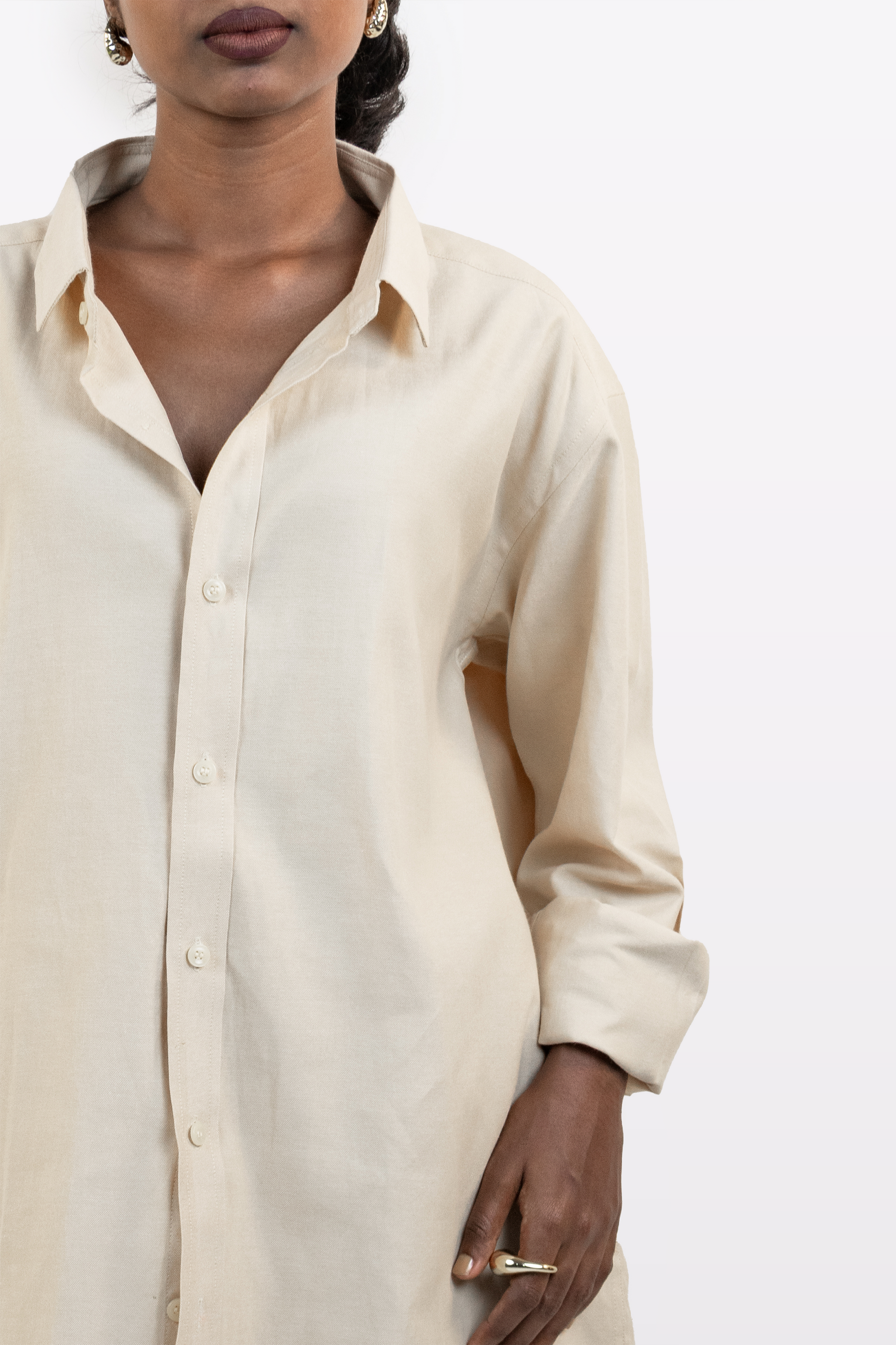 Front torso close-up of the Harper Slein Off White Oxford Shirt highlighting button placket and fabric drape on a white background