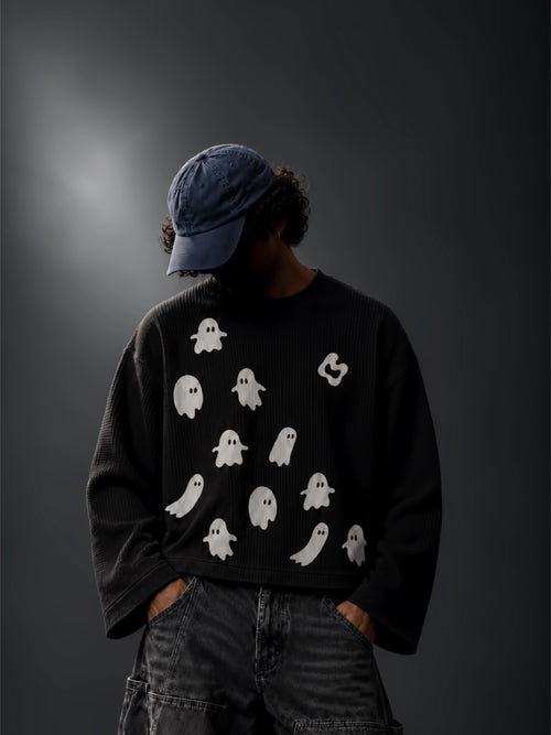 Afterlife oversized black waffle-knit tee worn by a model, front view