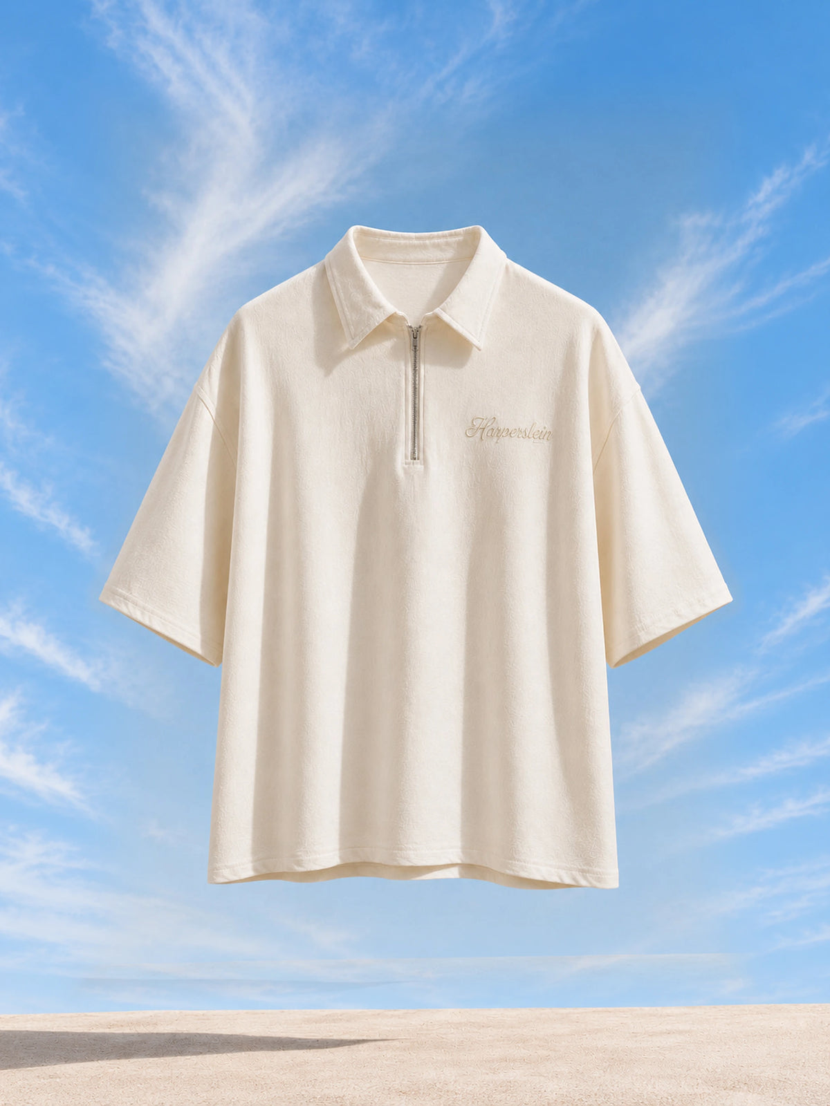 Cloud Zip Polo — flat lay