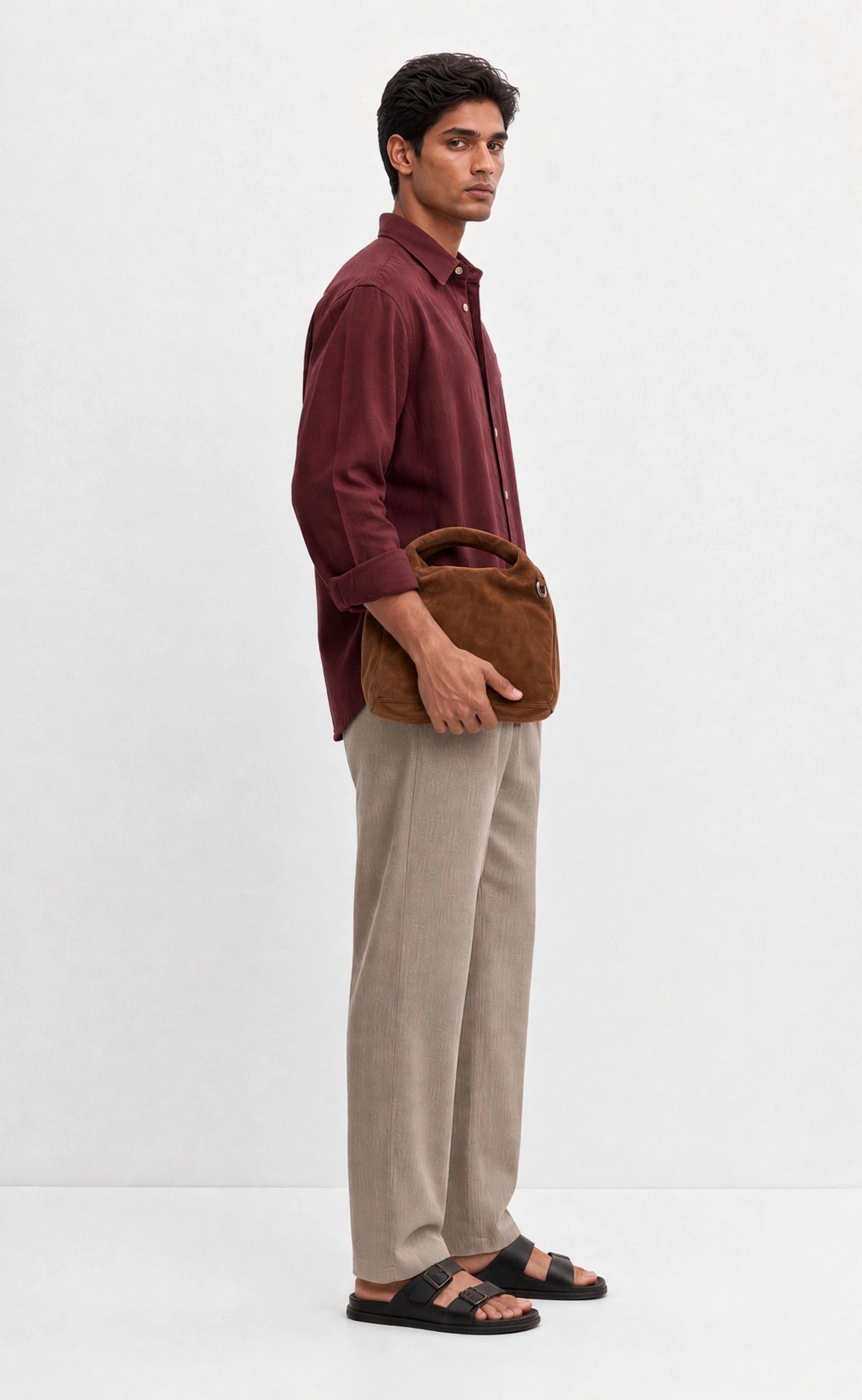 Burgundy cotton diya shirt worn by a model, side view