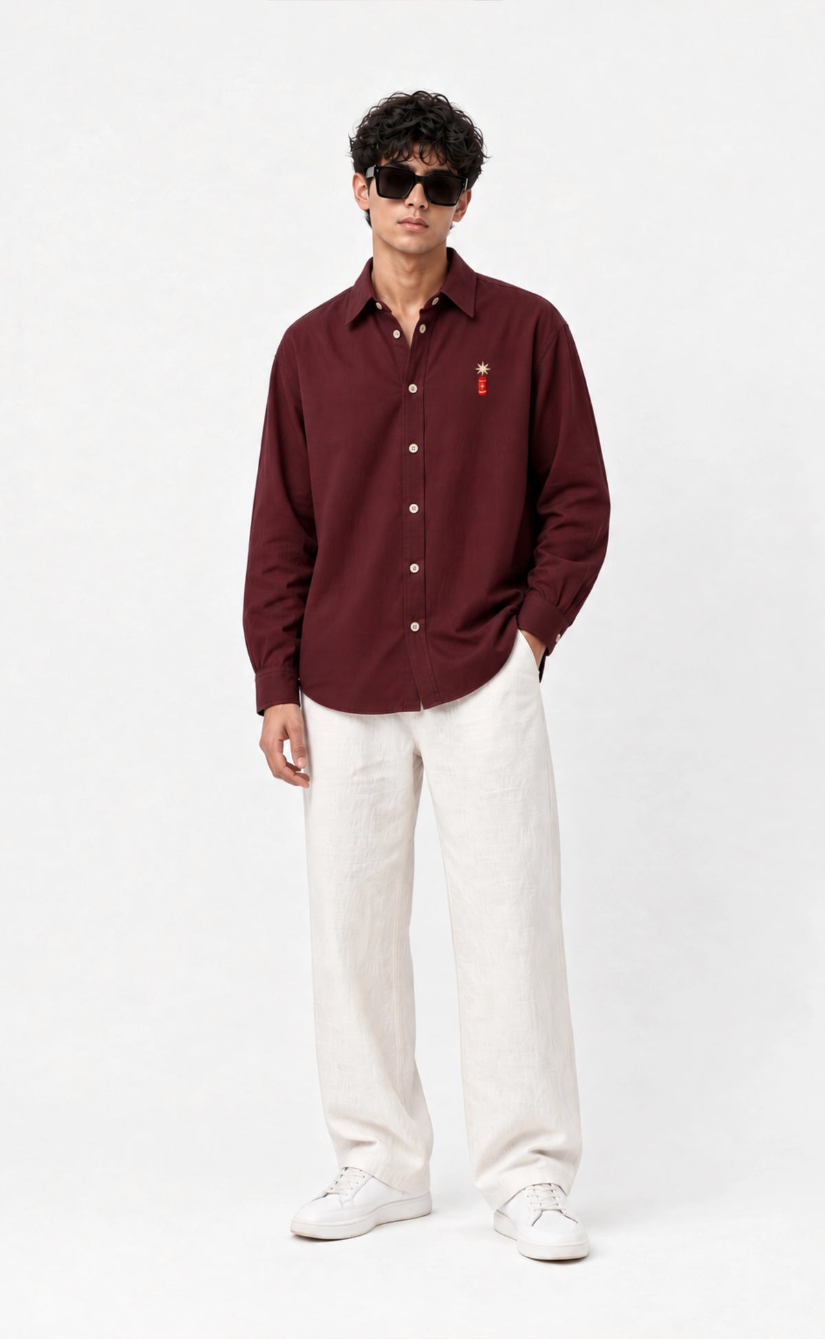 Burgundy cotton firecracker shirt worn by a model, front view