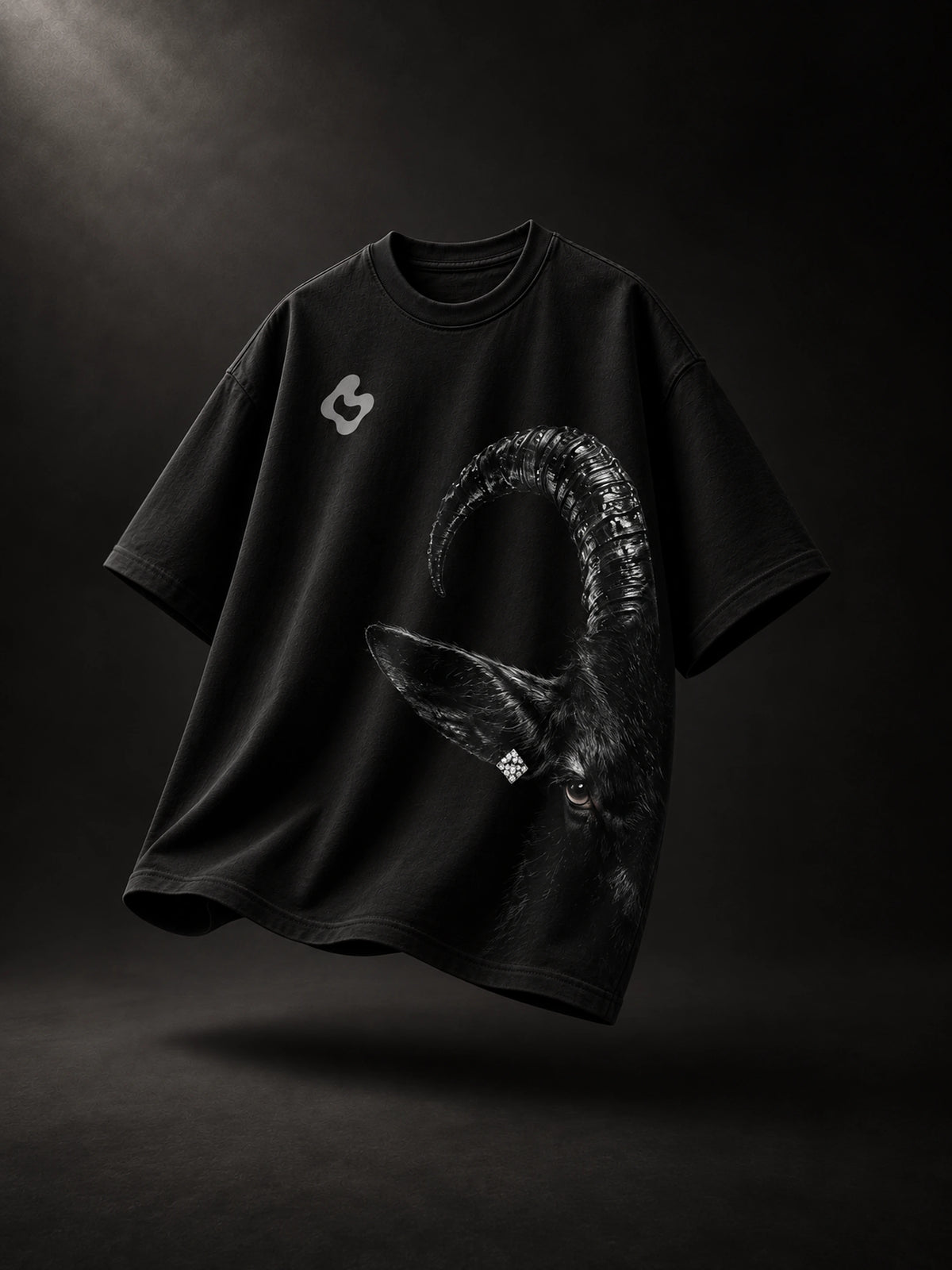 G.O.A.T. Status Rhinestone Tee — flat lay